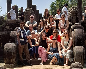 Group of tourists at ancient ruins in Sri Lanka