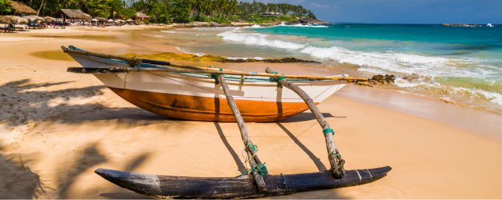 Traditional fishing boats on Sri Lankan beach
